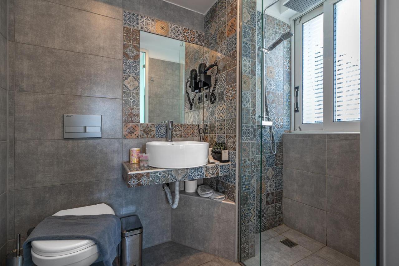 Aeolos Luxury Suites Athena Bagian luar foto