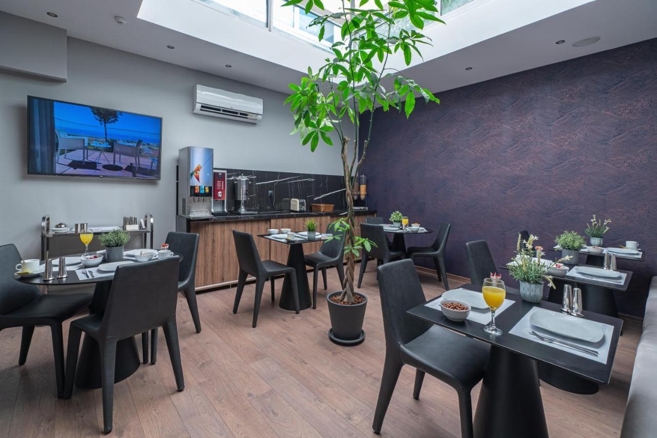 Aeolos Luxury Suites Athena Bagian luar foto