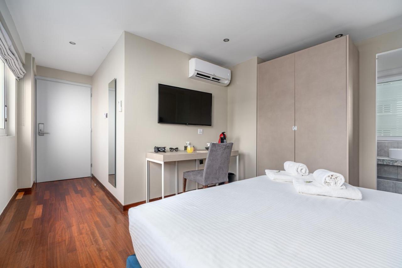 Aeolos Luxury Suites Athena Bagian luar foto