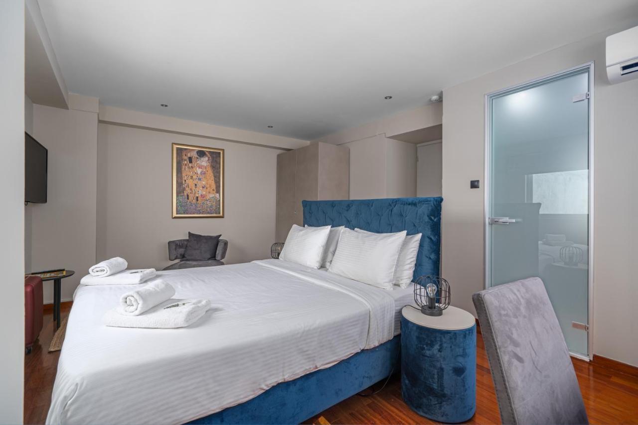 Aeolos Luxury Suites Athena Bagian luar foto
