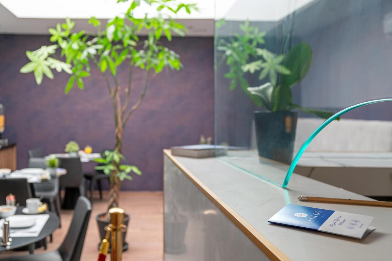 Aeolos Luxury Suites Athena Bagian luar foto