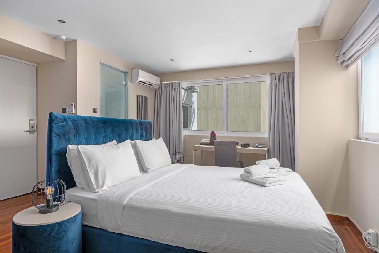 Aeolos Luxury Suites Athena Bagian luar foto
