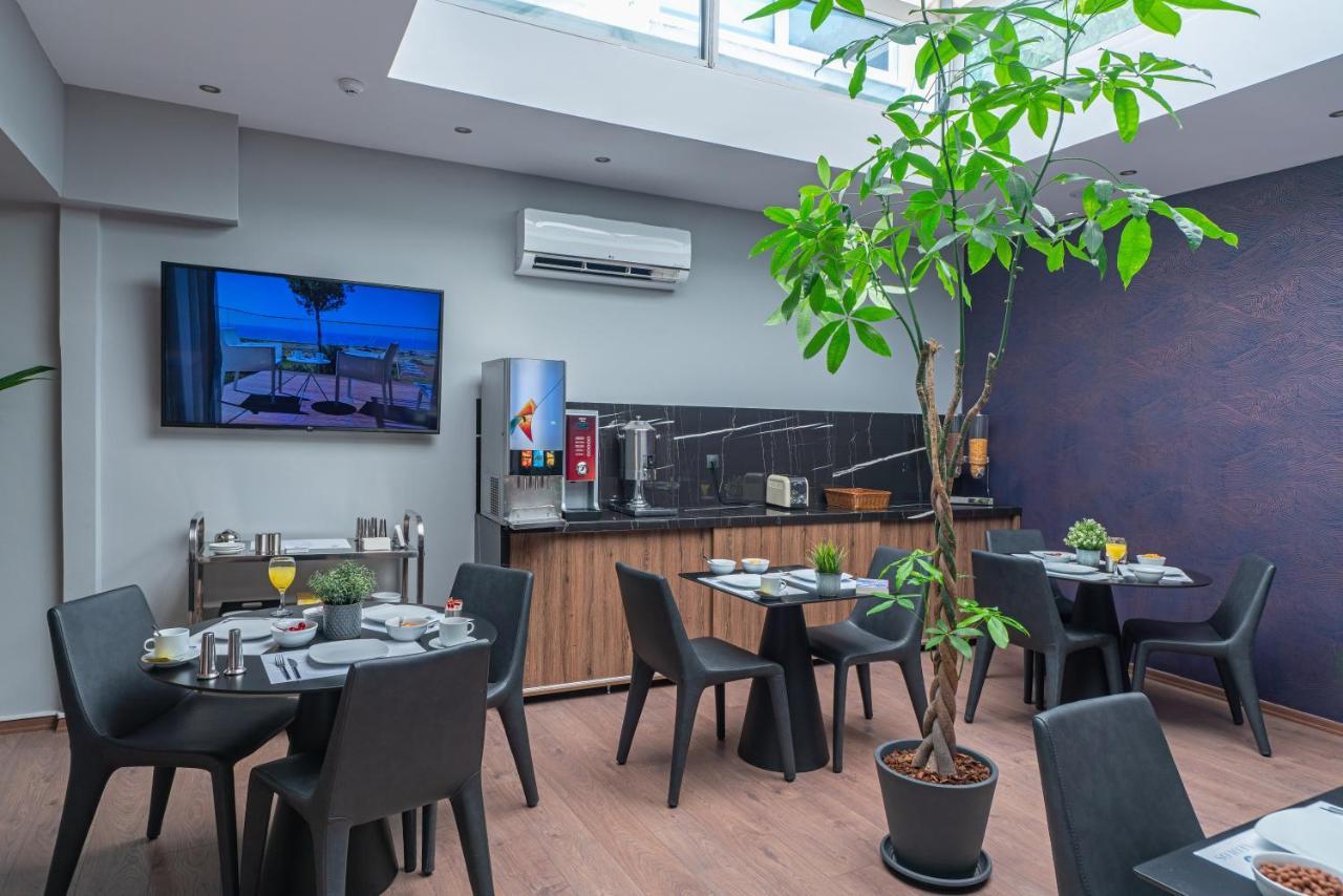 Aeolos Luxury Suites Athena Bagian luar foto