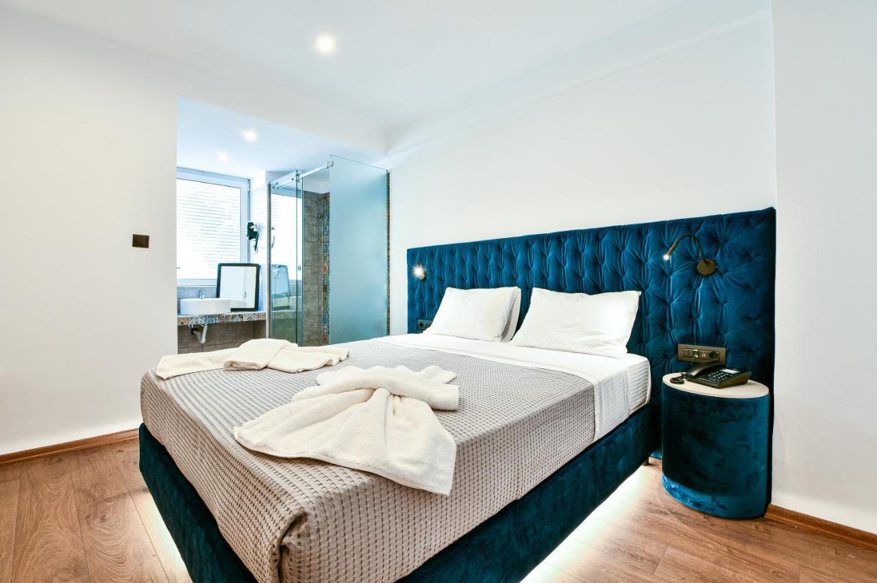 Aeolos Luxury Suites Athena Bagian luar foto