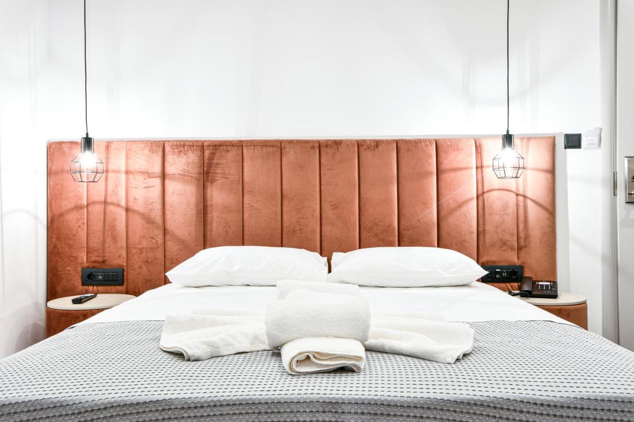 Aeolos Luxury Suites Athena Bagian luar foto