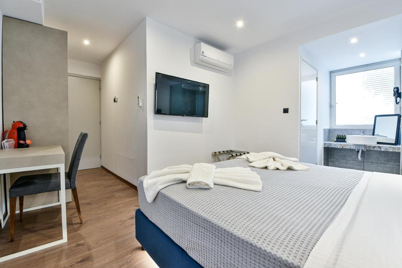 Aeolos Luxury Suites Athena Bagian luar foto